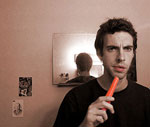 click for larger: self portrait with carrot. taken june 2002 in our sherman oaks apartment